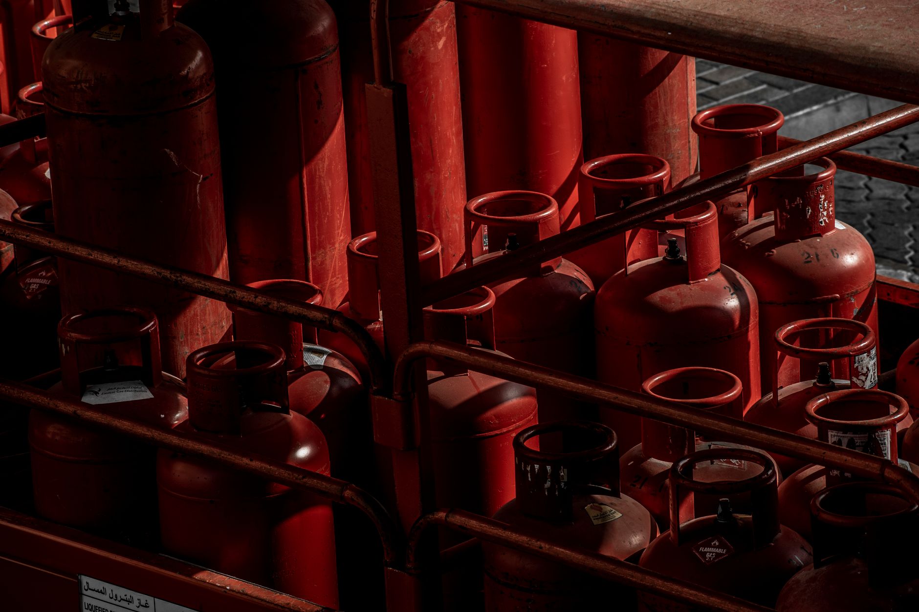 Industrial gas cylinders and welding equipment at a UAE warehouse ready for B2B wholesale supply