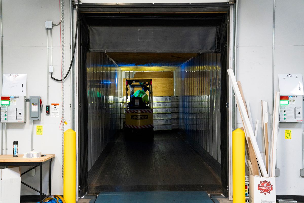 Cold storage warehouse interior with temperature-controlled pallets, UAE