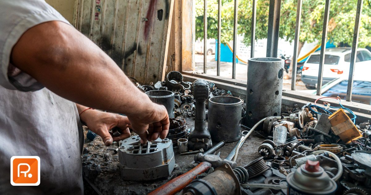 How to Source Automotive Spare Parts Wholesale in the UAE: B2B Buyer's Guide 2026 - close-up of a mechanic's hands working