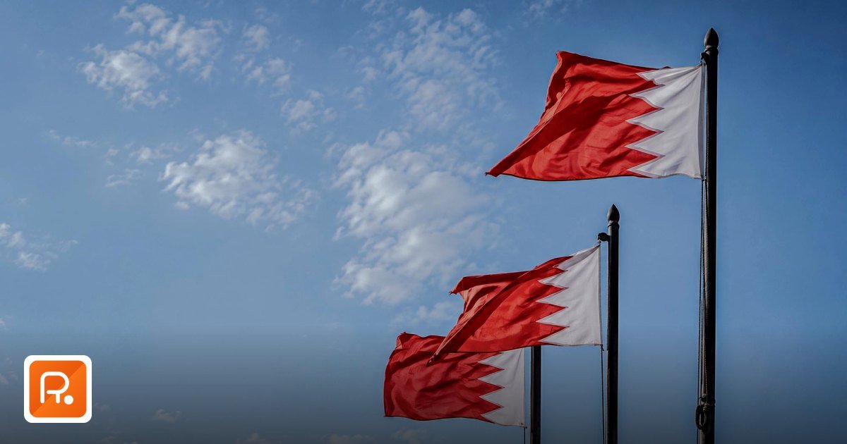 Bahrain Wholesale Distributors: B2B Buyer's Guide 2026 - three flags fluttering against a clear blue sky in ,