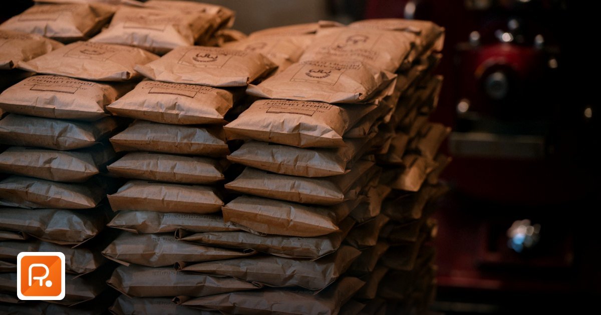Tier 2 Suppliers Bulk Corporate Gifts UAE – Quality & Savings - stacked brown paper packages in an industrial warehouse