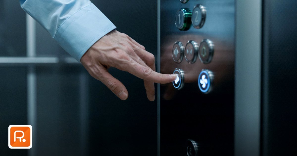 Elevator Suppliers UAE 2026: B2B Procurement and Maintenance Contract Guide - a person pressing an elevator button