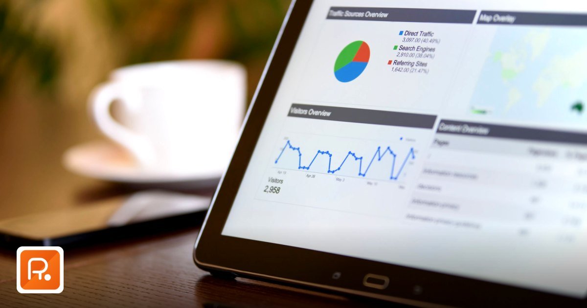 AI Spend Analytics for Corporate Gifting UAE: A 2026 Guide - close-up of a tablet displaying analytics charts on a wooden
