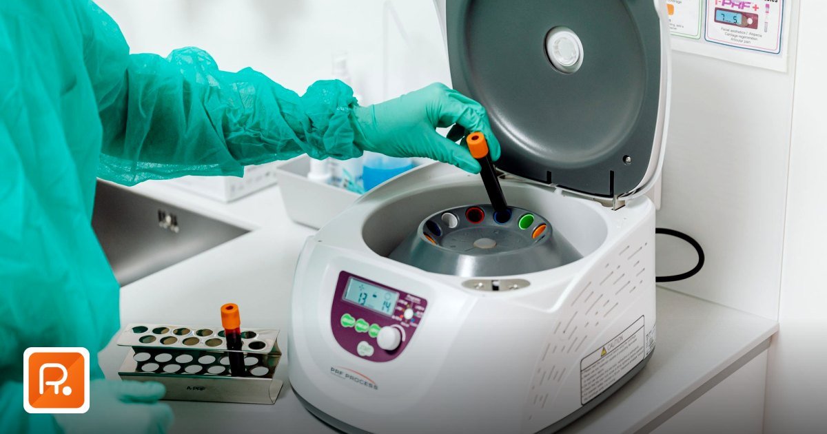 Laboratory Equipment Suppliers UAE: B2B Sourcing Guide 2026 - a healthcare professional operates a centrifuge machine