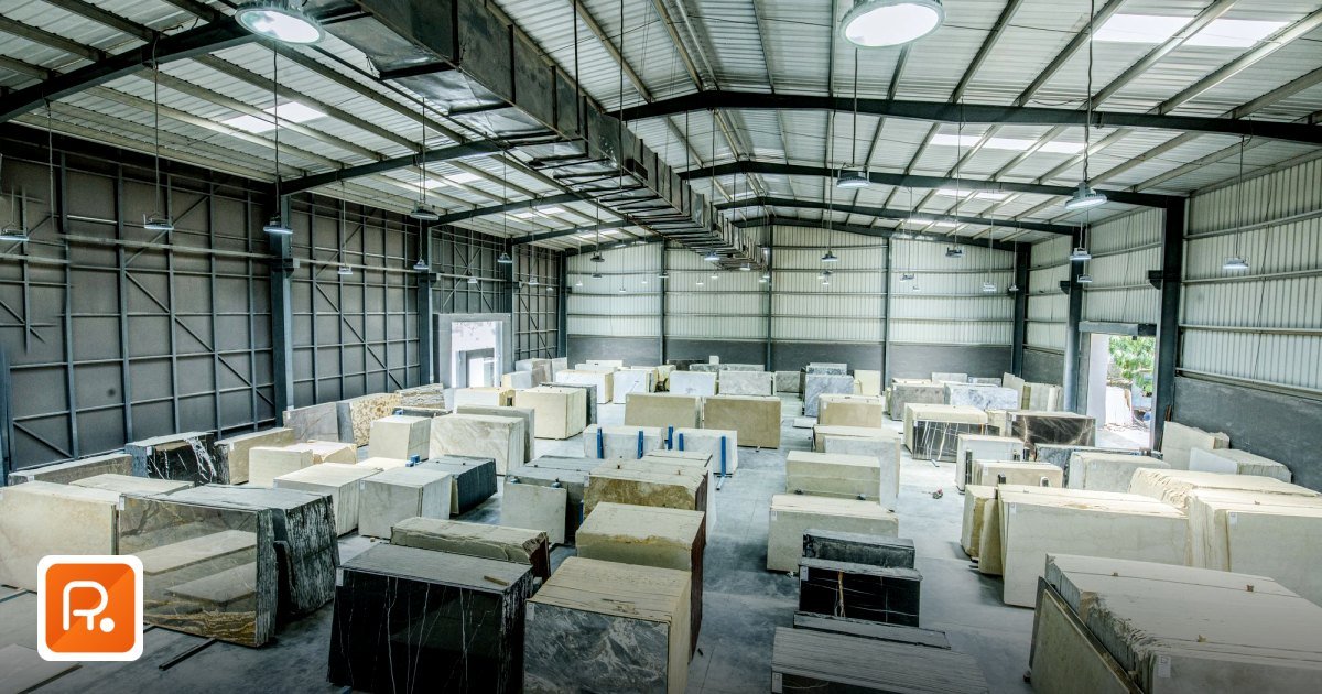 Qatar Wholesale Distributors: B2B Buyer's Guide 2026 - expansive warehouse filled with large stone slabs for industrial use