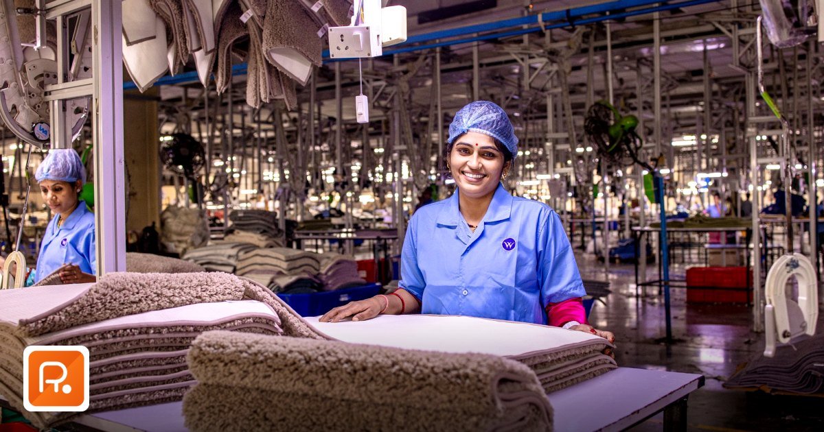 Uniform Manufacturers UAE Wholesale 2026: The Corporate Bulk Sourcing Guide - female worker operates sewing machine