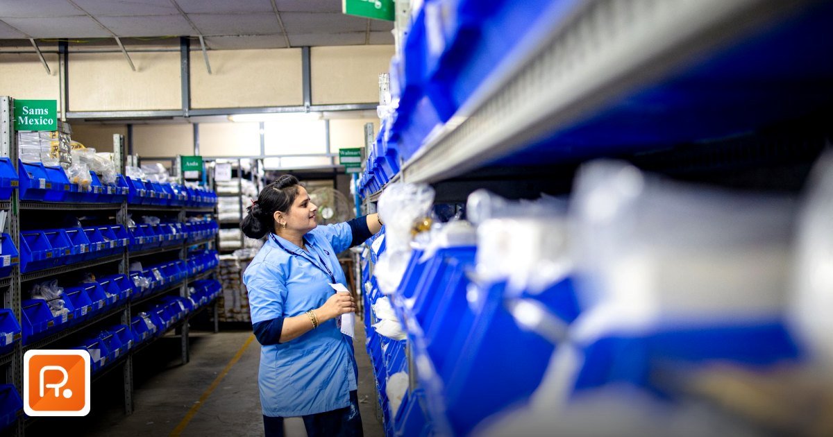 What are the Best Practices for B2B Procurement in UAE? - a woman in a warehouse organizes inventory shelves with labeled