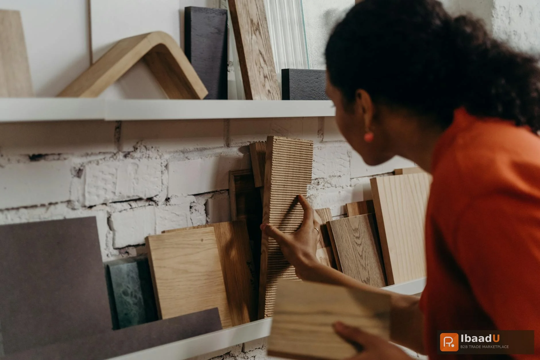 Procurement manager reviewing construction materials at a Gulf region warehouse